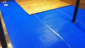 Combine a DMX 1-Step underlay with a plywood sub-floor, and the basement is warm, quiet and mold-resistant