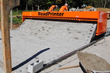 Belgium-made RoadPrinter lays paving stone patterns up to 20 feet wide