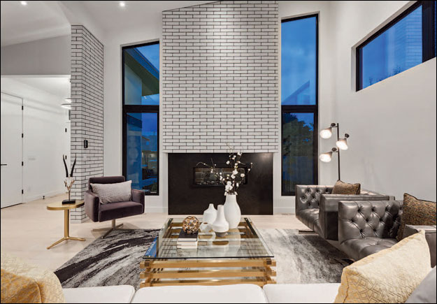 Interior image featuring lighting, taken at dusk. West Ridge Fine Homes Ltd., Calgary, Alta. The 2019 CHBA National Awards for Housing Excellence winner for the renovation category "Whole House – $500,000 to $1 million."